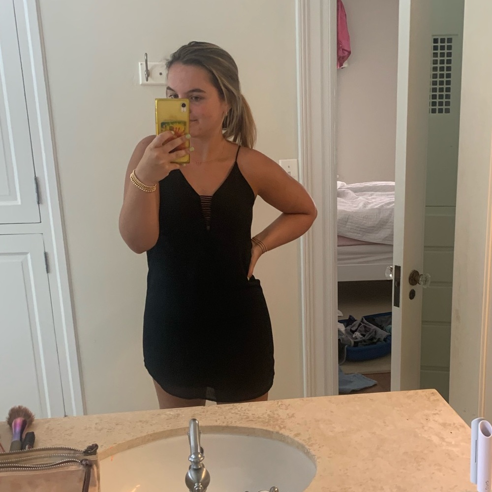 Black mini dress with lined details size small